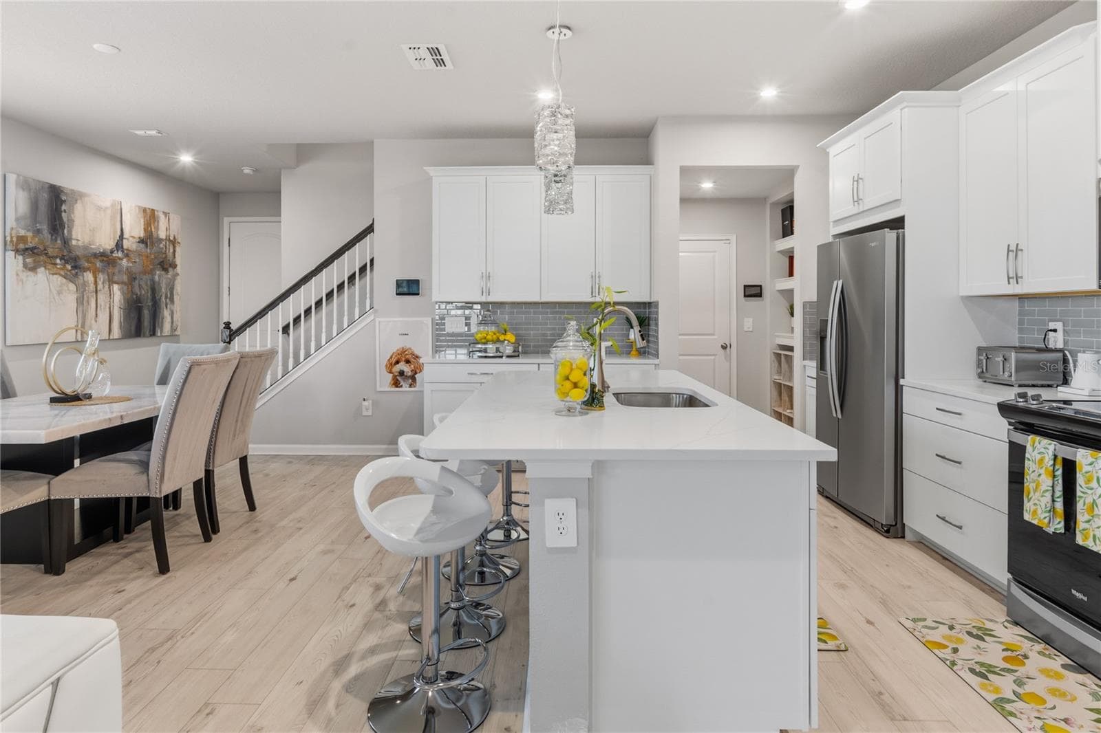 Formal dinning to the left, kitchen to the right - 4062 CLOUD HOPPER WAY, LUTZ