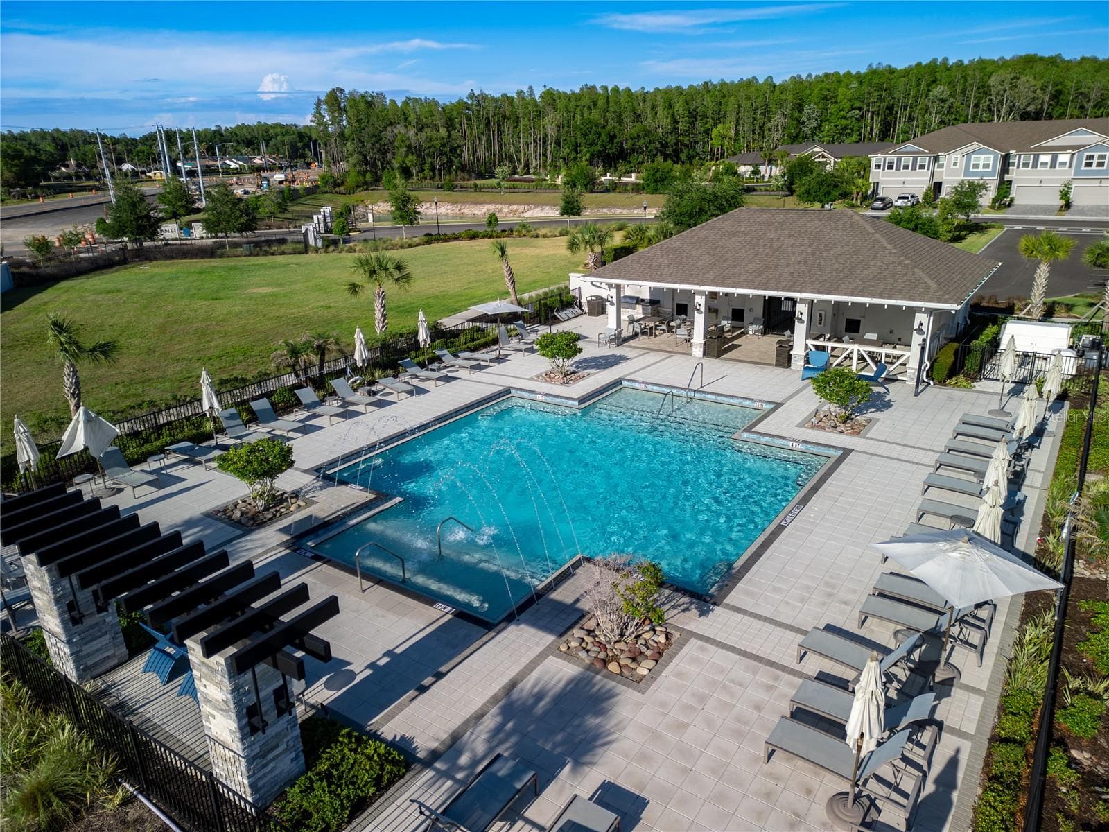 Community pool with lounge tables - 4062 CLOUD HOPPER WAY, LUTZ