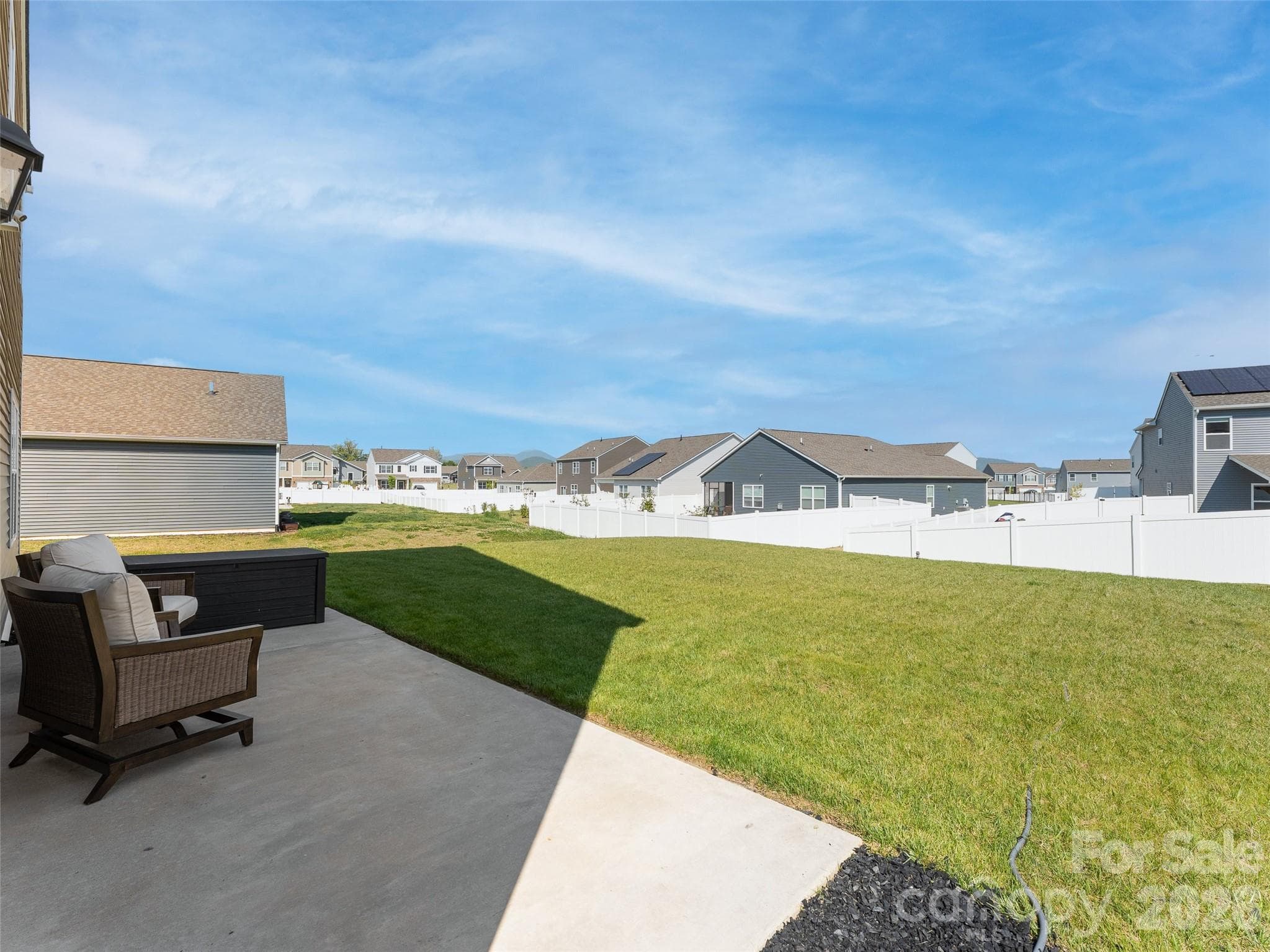 Back patio and yard - 141 Wheatfield Road, Fletcher