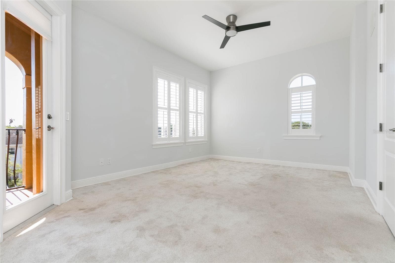 Primary Bedroom is large with private balcony - 114 E DAVIS BLVD #13, TAMPA