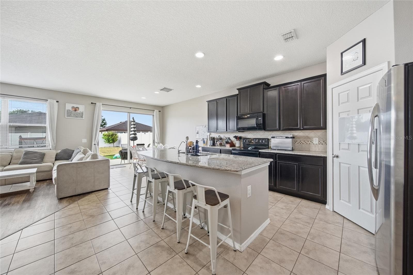 Kitchen / Living Room / Dining Room Combination - 15476 STONE HOUSE DR, BROOKSVILLE