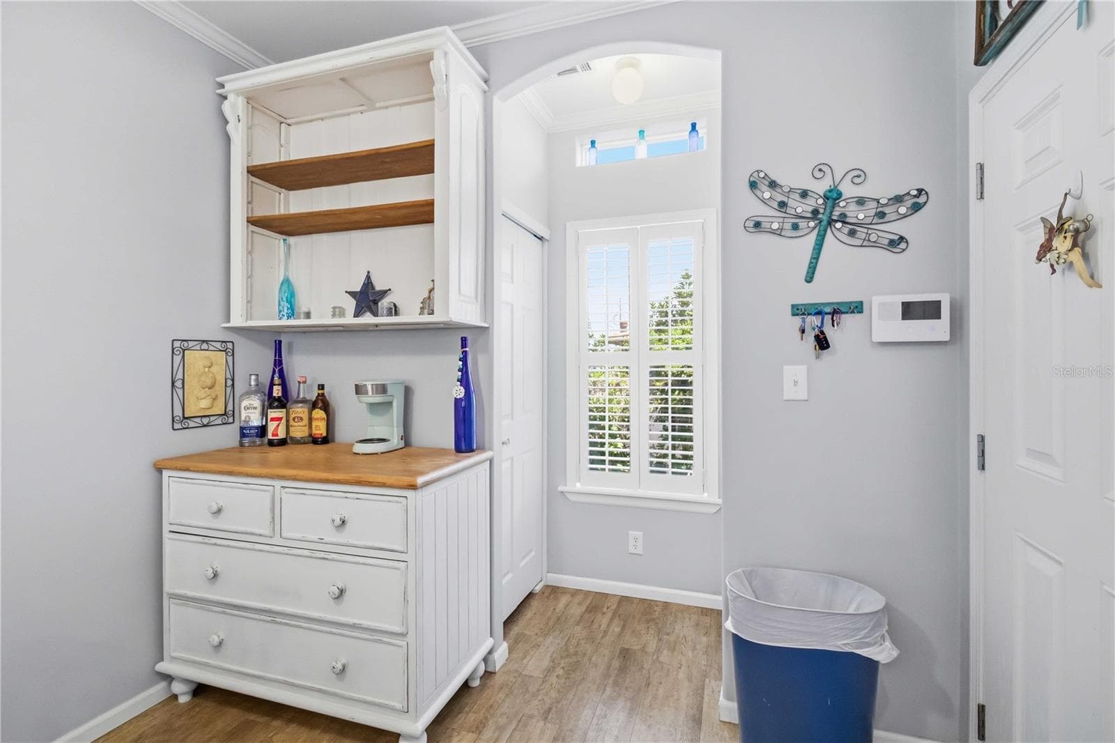 Laundry closet is in door behind hutch. - 915 50TH AVE W, BRADENTON