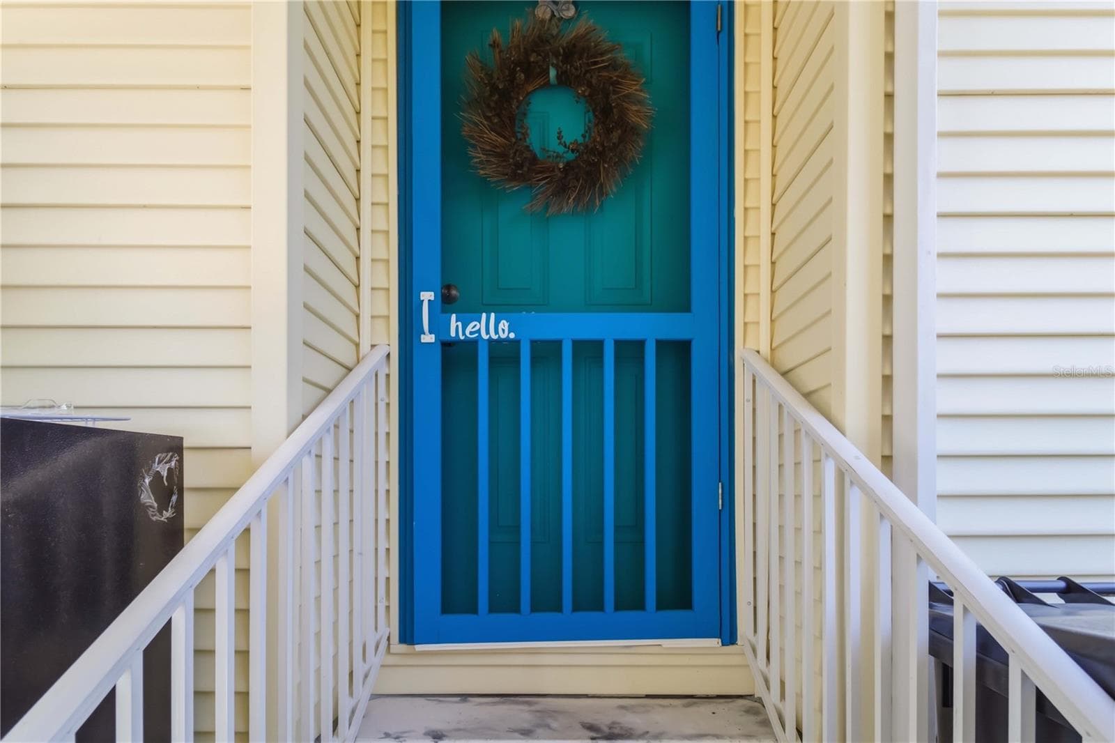 Hello! Cheery entrance from carport. - 915 50TH AVE W, BRADENTON
