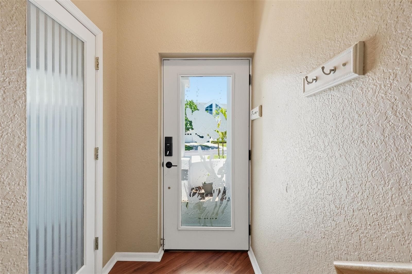 Door on left is entry to garage - 14837 SEMINOLE TRL, SEMINOLE