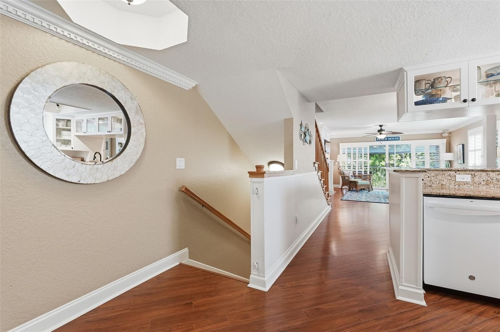 View from top of 2nd floor landing to the screened patio. - 14837 SEMINOLE TRL, SEMINOLE