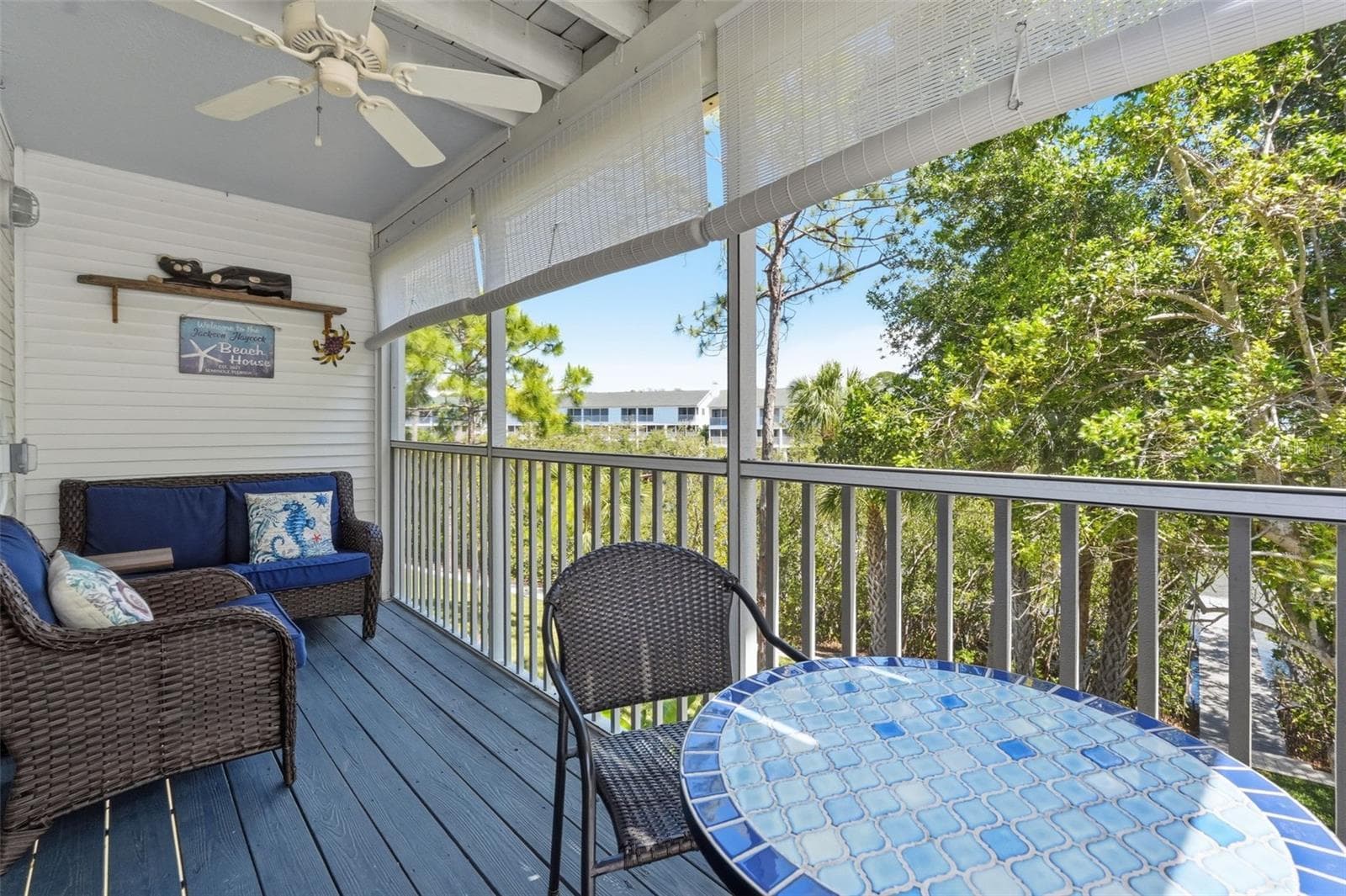 Screened Patio with ceiling fan overlooking the water. - 14837 SEMINOLE TRL, SEMINOLE