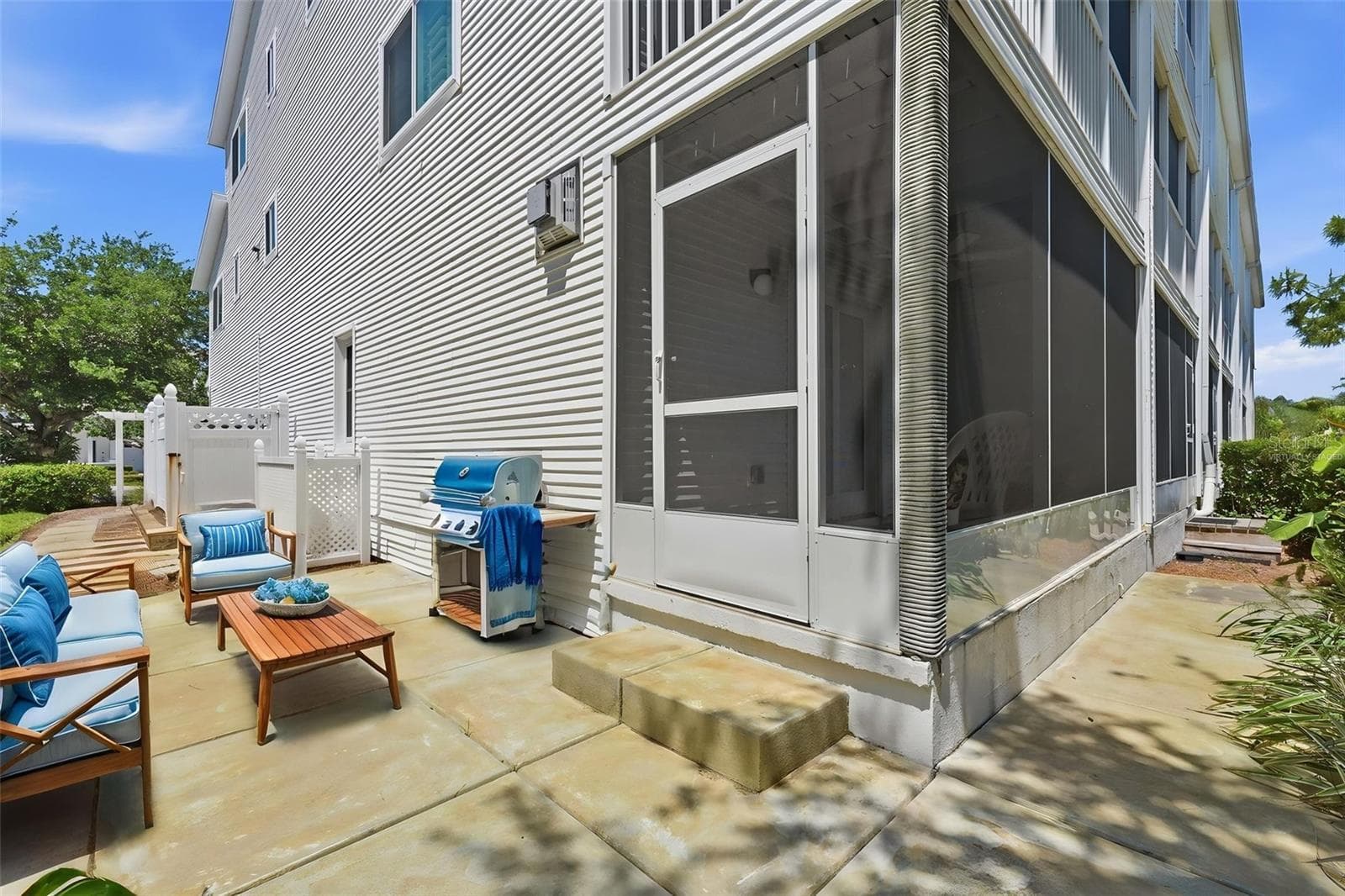 Virtually staged side concrete patio - 14837 SEMINOLE TRL, SEMINOLE