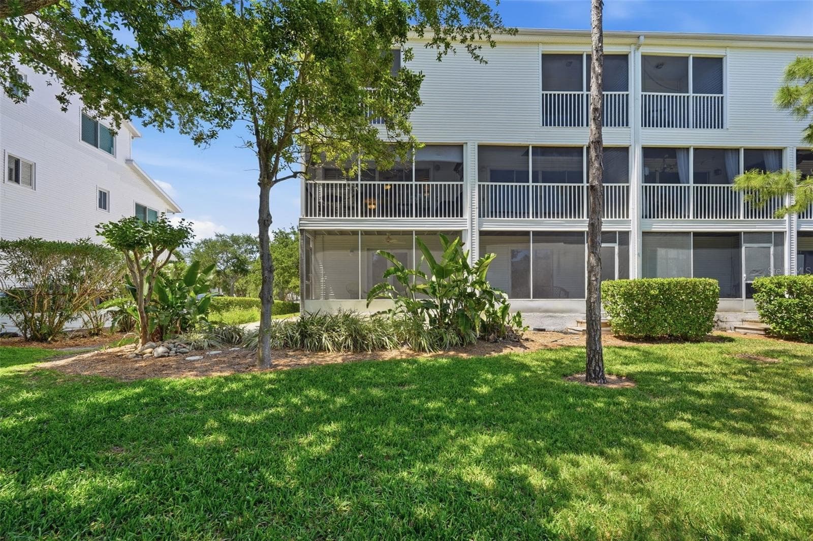 Tranquil Green space behind the townhome. - 14837 SEMINOLE TRL, SEMINOLE