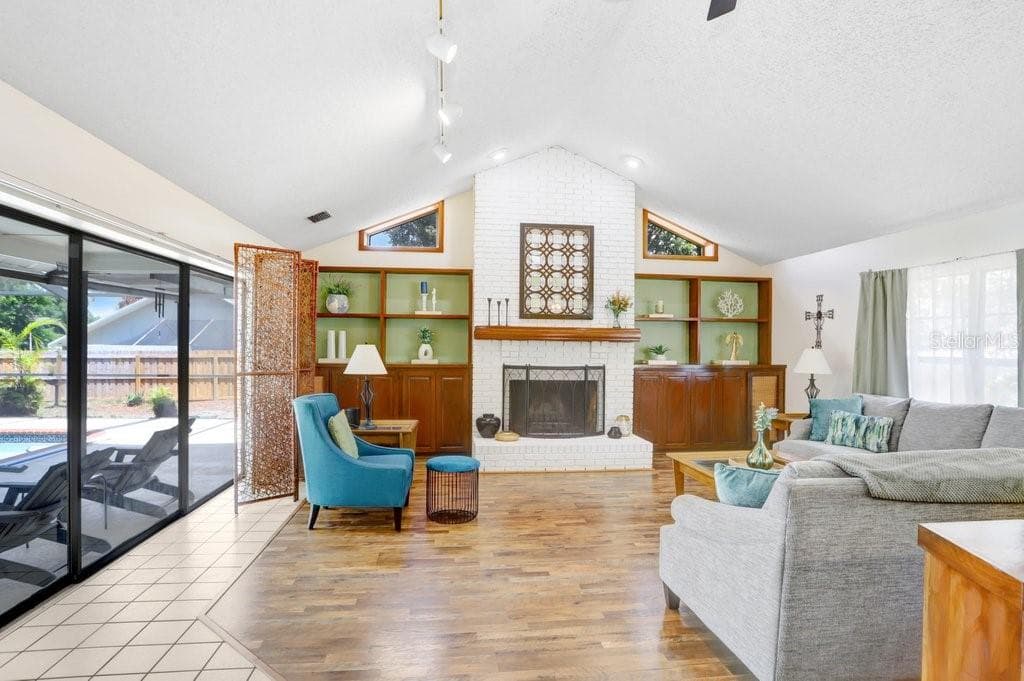 Family Room with Fireplace and Built ins - 507 SPORTSMAN PARK DR, SEFFNER