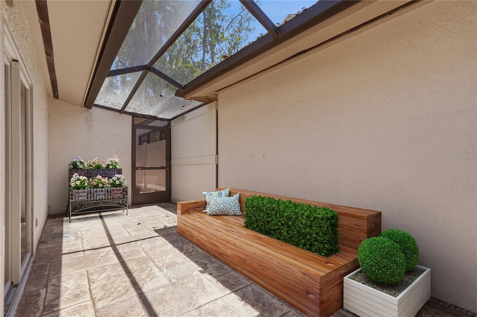 Virtually Staged Courtyard - 3071 BOLT DR, PALM HARBOR