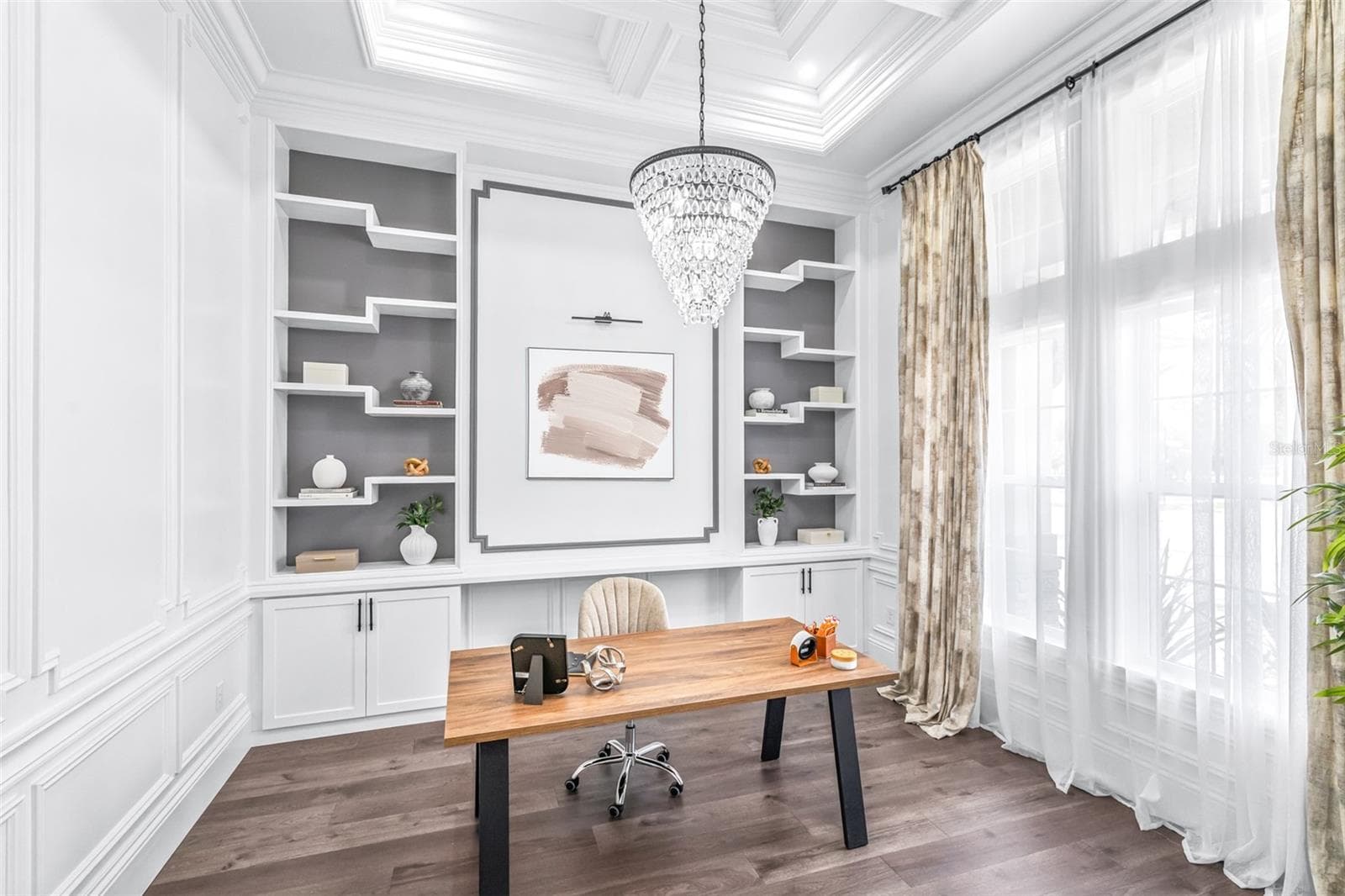 Well-Appointed Office Features Custom Built-ins, Chandelier, and Poplar Trim Throughout - 7190 GRAYBROOK DR, WESLEY CHAPEL