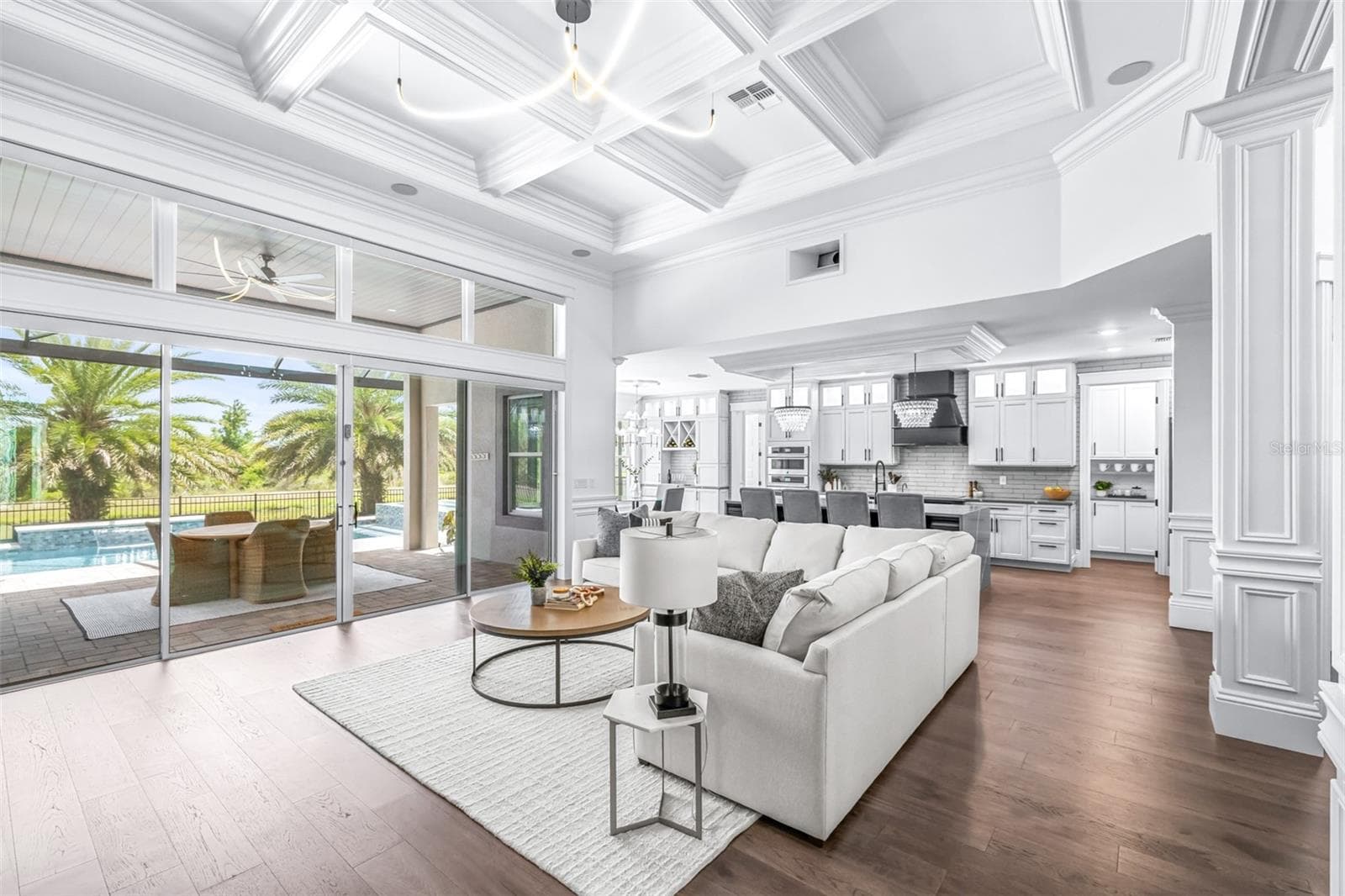 The Oversized Living Room is the Heart of the Home, Boasting Poplar Trim, Coffered Ceiling, a Tailor-made Home Theatre System Like No Other - 7190 GRAYBROOK DR, WESLEY CHAPEL