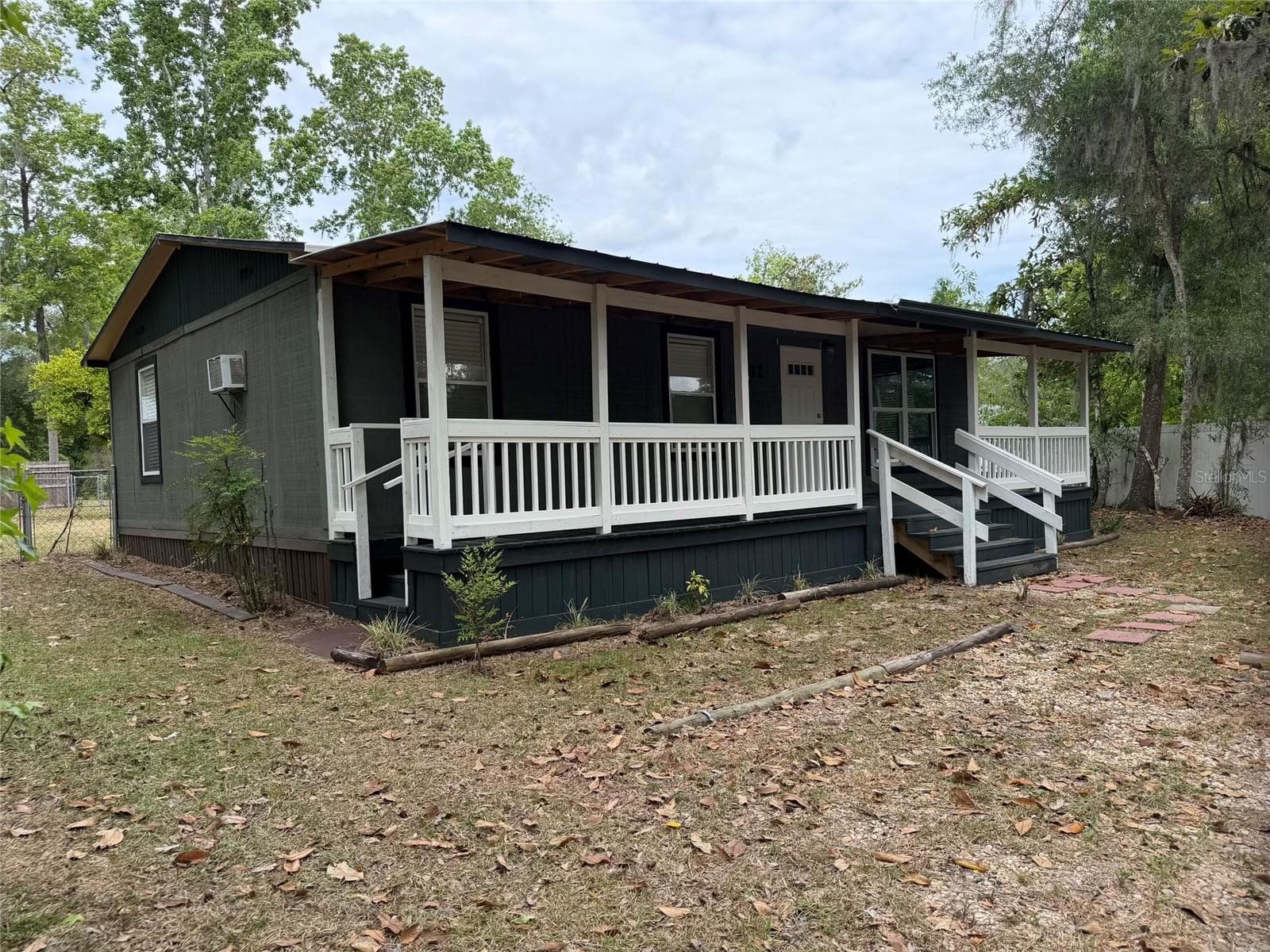 Mobile Home at 8732 CR 647 S, BUSHNELL, photo 2 of 25
