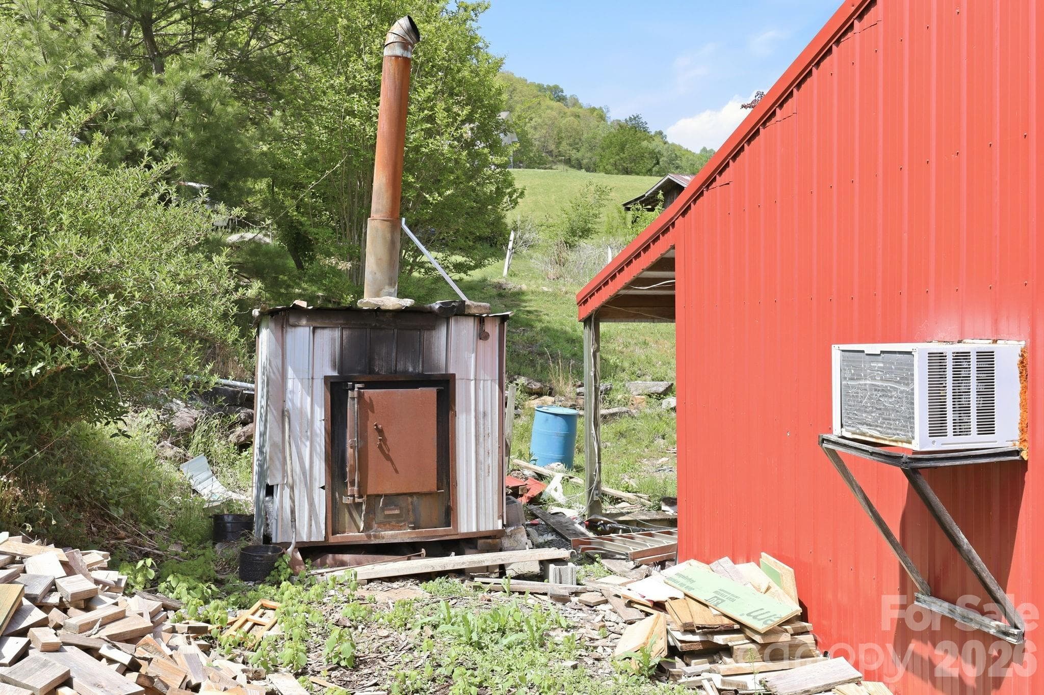 Outdoor wood boiler for workshop - 2225 Bald Creek Road, Clyde