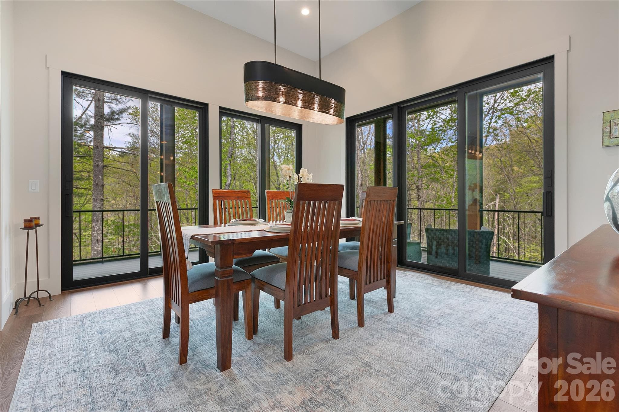 The dining room, designed with the intention of providing a welcoming and functional space perfect for hosting both entertaining gatherings with guests and cherished family get-togethers. - Brevard