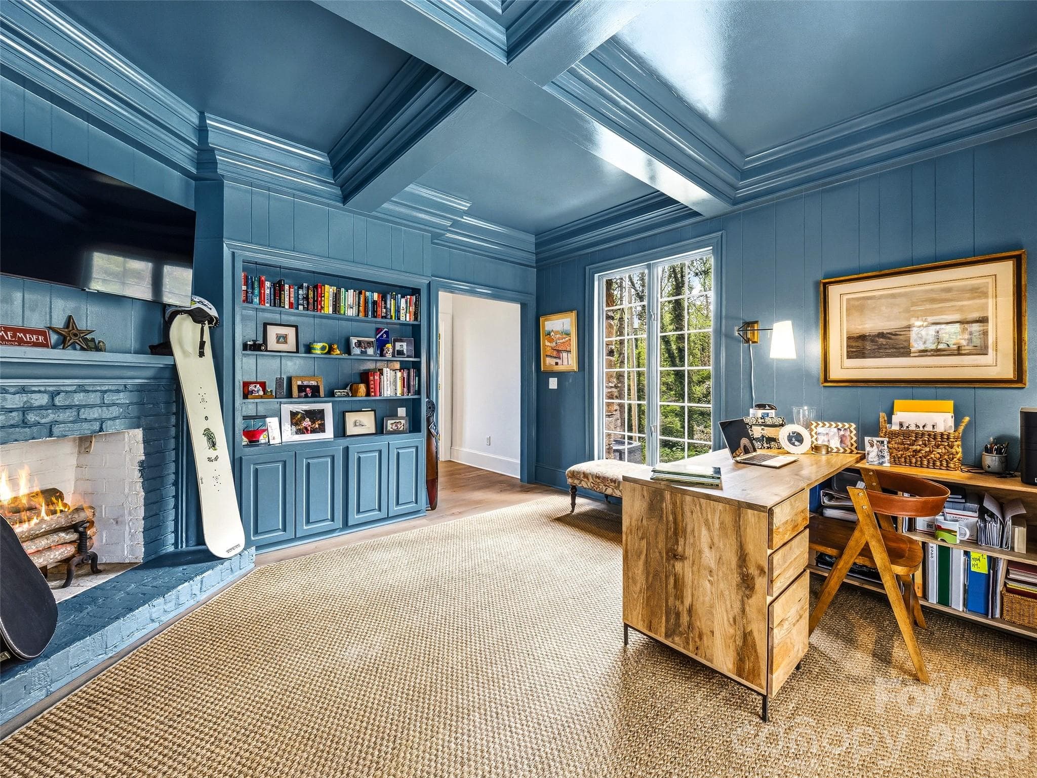 Office on the main floor overlooking the pool with a wood burning fireplace. There is also a private powder bath off of this space. - 10 Kalimar Heights, Hendersonville