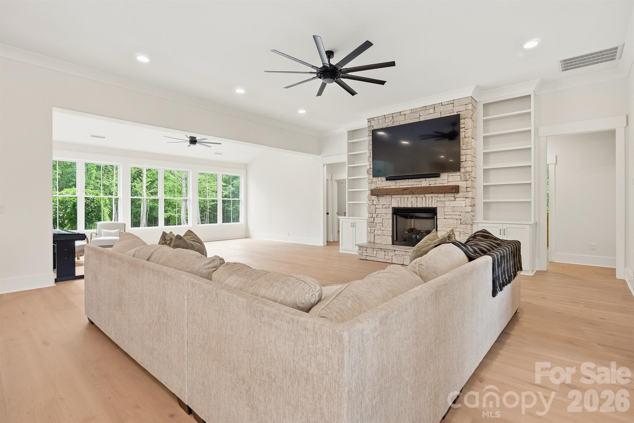 Living Room with Gas Log Fireplace and Built-ins - 2855 Long Run Farm Road, Mount Pleasant