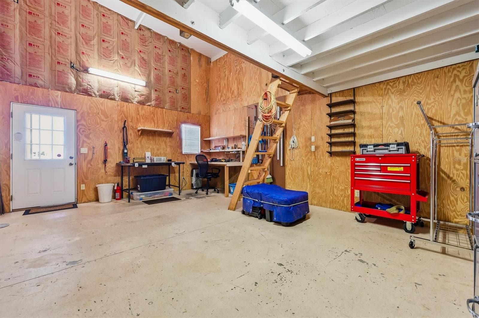 Workshop with large loft and pulley lift. - 10027 EQUITY AVE, DADE CITY