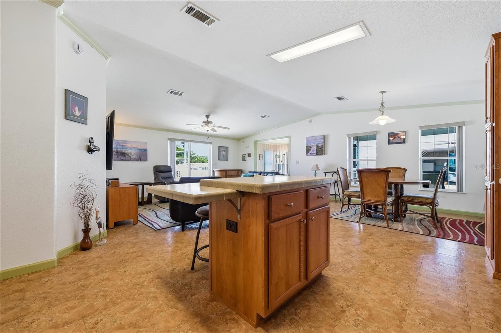 Nice kitchen island with storage - 10027 EQUITY AVE, DADE CITY