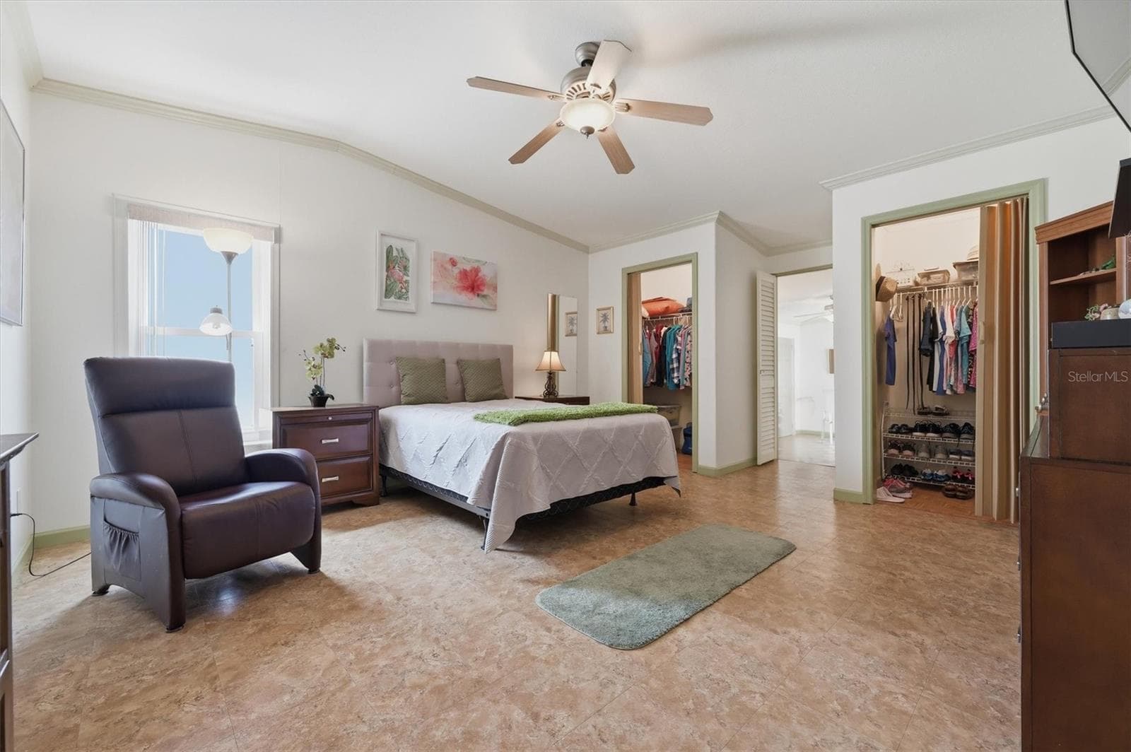Large Main bedroom with double closets, and access into office, den, or additional flex room. - 10027 EQUITY AVE, DADE CITY