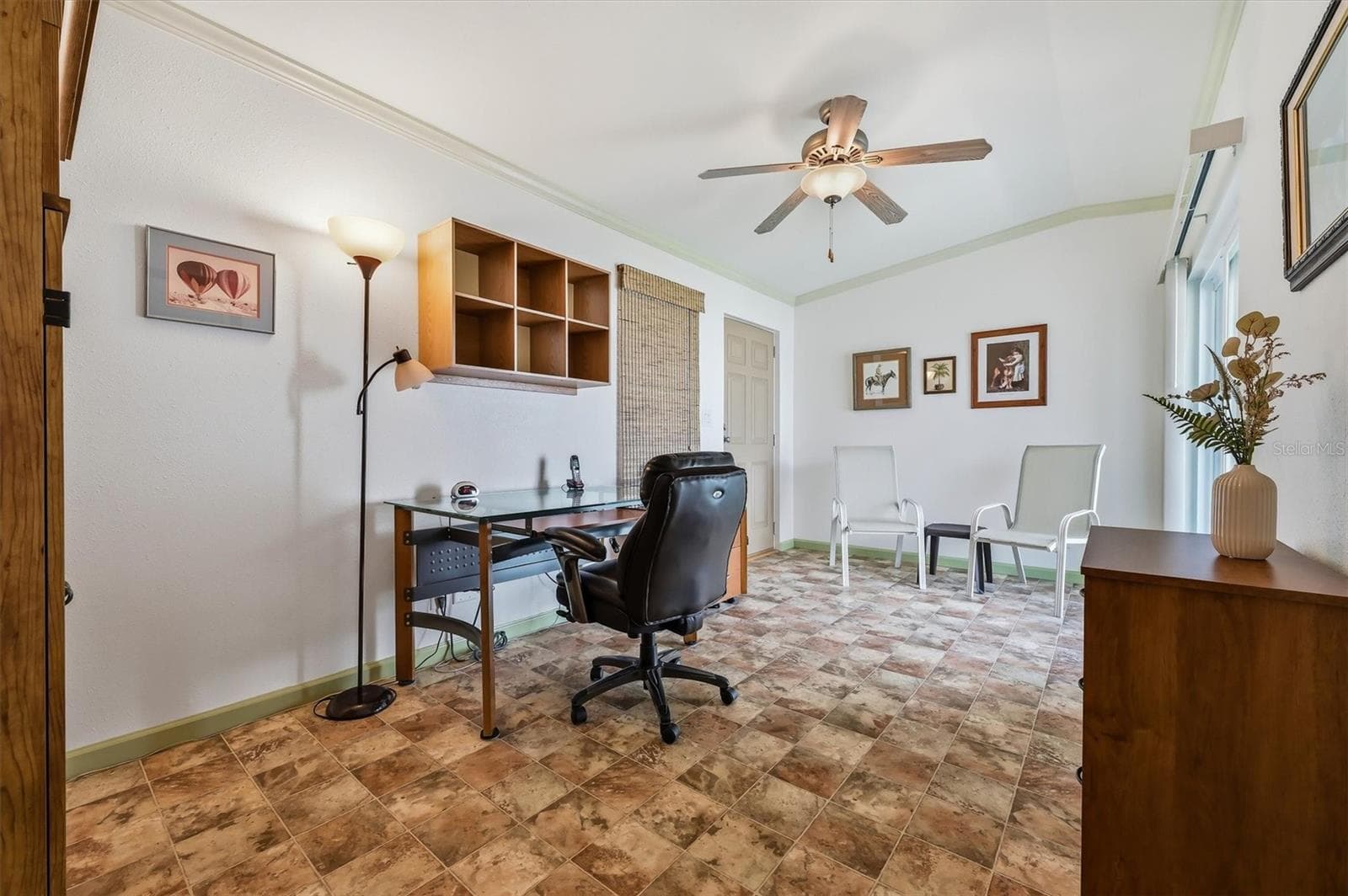 Enter office or private den through main bedroom,  but it has it's own entry as well. - 10027 EQUITY AVE, DADE CITY