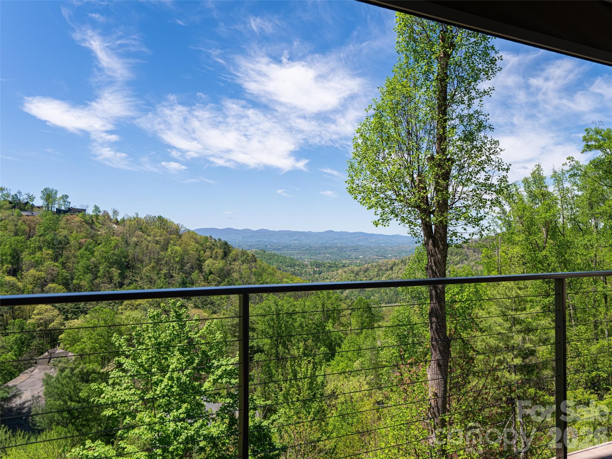 See through cable railings allow for unobstructed views from deck - 32 Timberwolf Court, Asheville