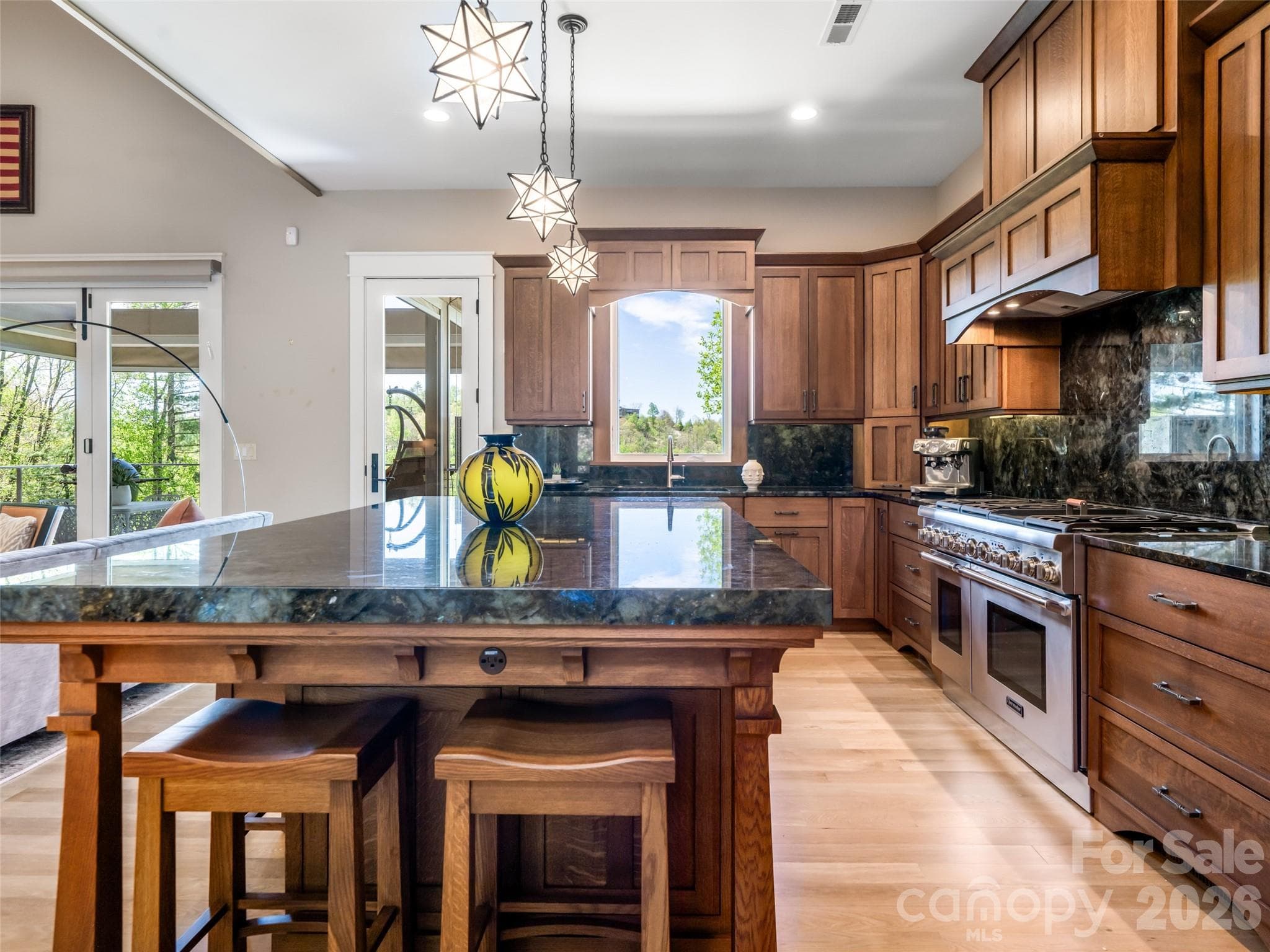 Chef's Kitchen with western facing views. Open concept allowing for spacious entertaining - 32 Timberwolf Court, Asheville