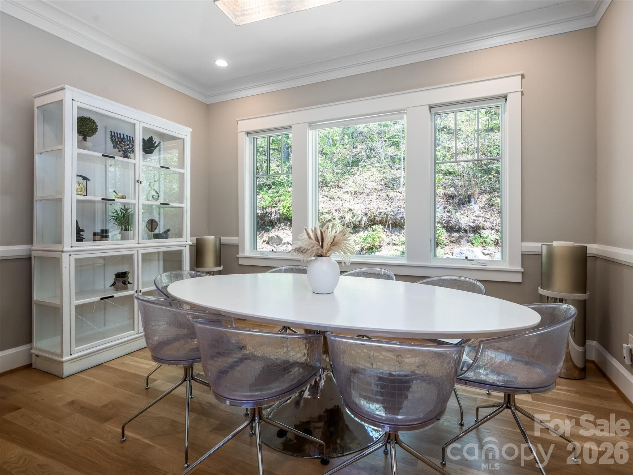Large inviting dining area filled with natural light - 32 Timberwolf Court, Asheville