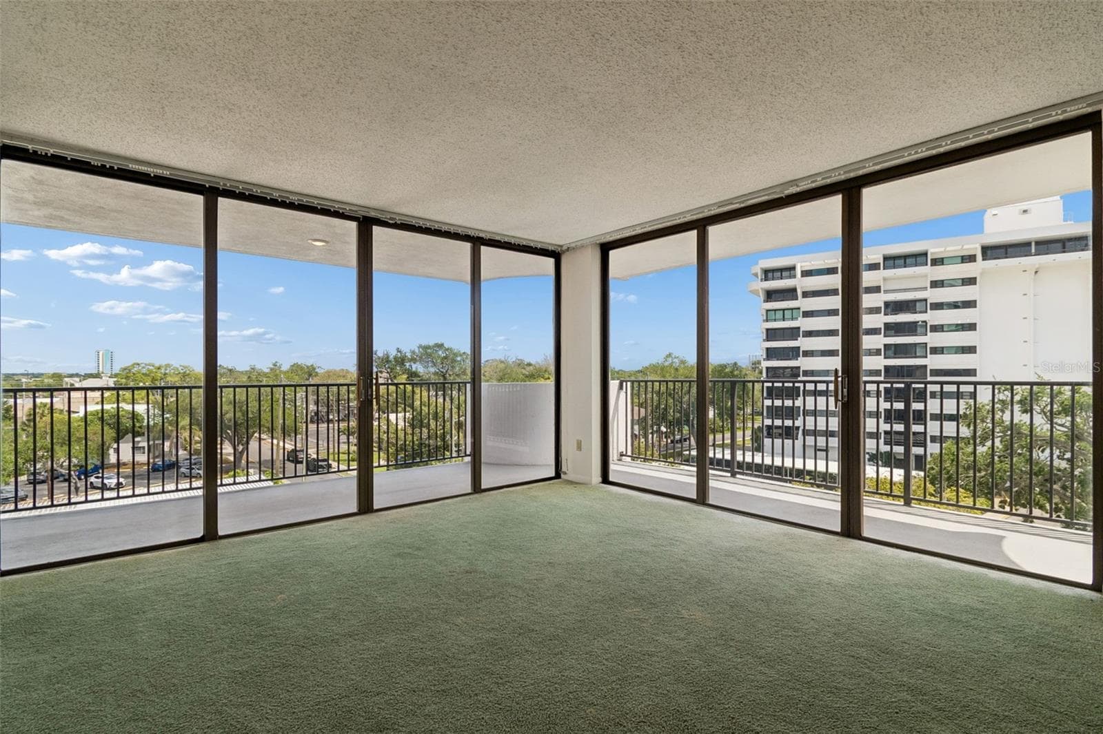 Floor to Ceiling Sliders and Balcony! - 80 ROGERS ST #6C, CLEARWATER