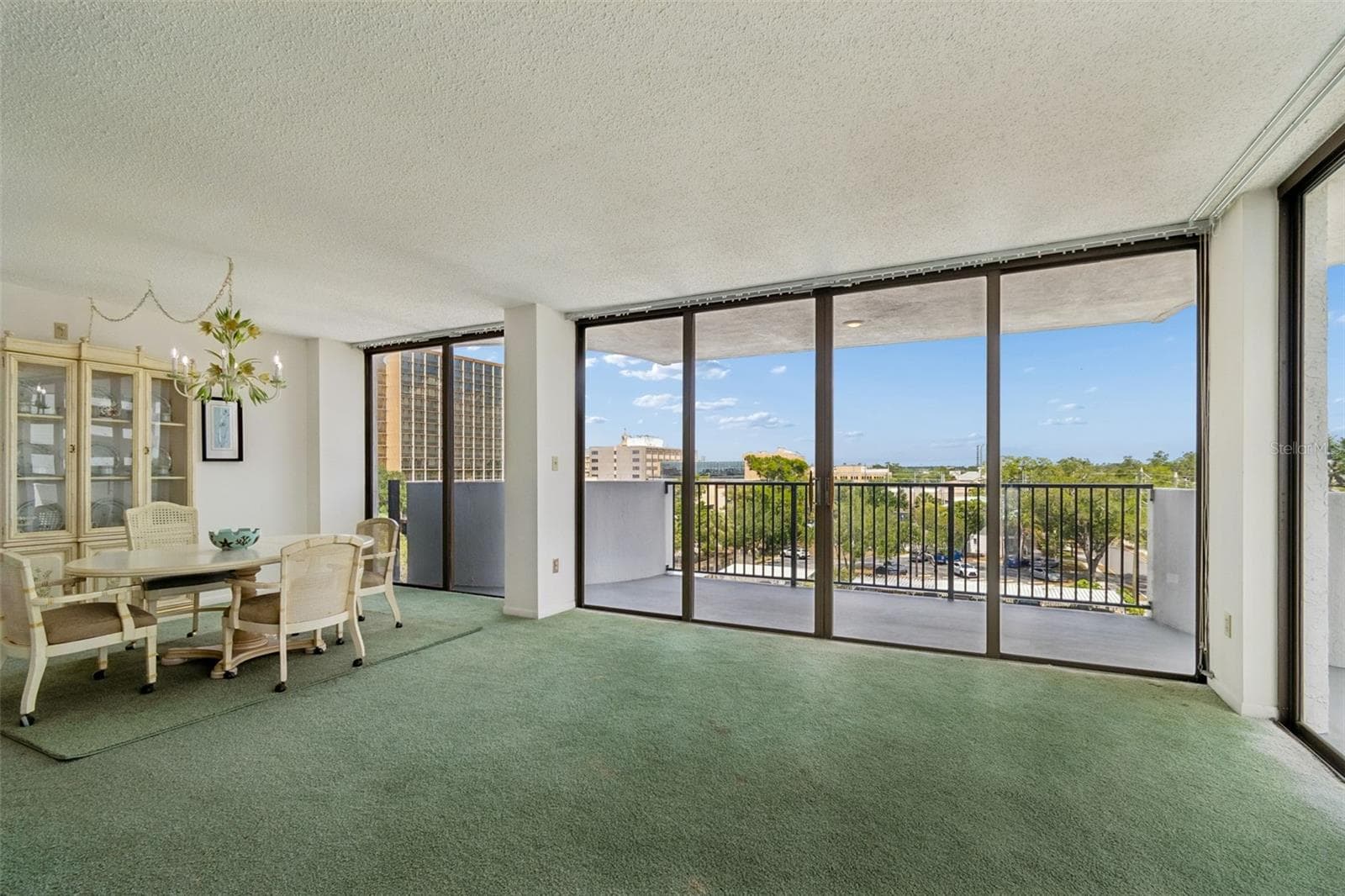 Floor to Ceiling Sliders and Balcony! - 80 ROGERS ST #6C, CLEARWATER