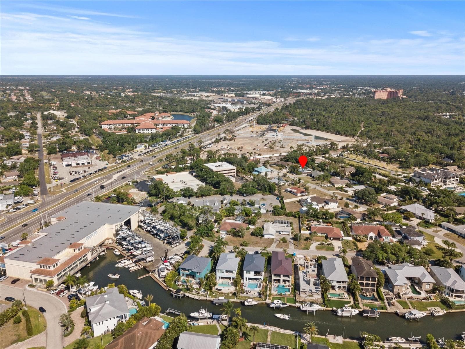 drone picture of neighborhood and BAY - 7860 HOLIDAY DR, SARASOTA