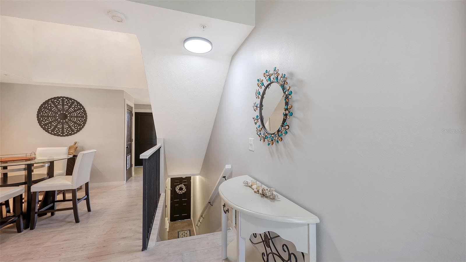 Up one flight of stairs to the living and kitchen area. - 5655 BENTGRASS DR #9-116, SARASOTA