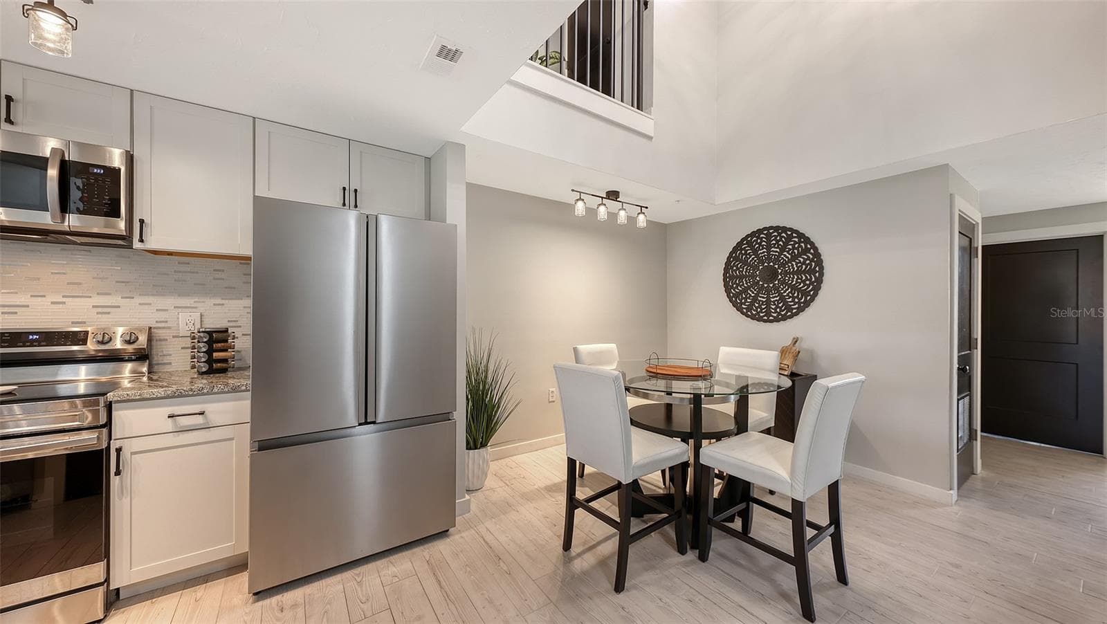 A spacious and inviting kitchen area. - 5655 BENTGRASS DR #9-116, SARASOTA