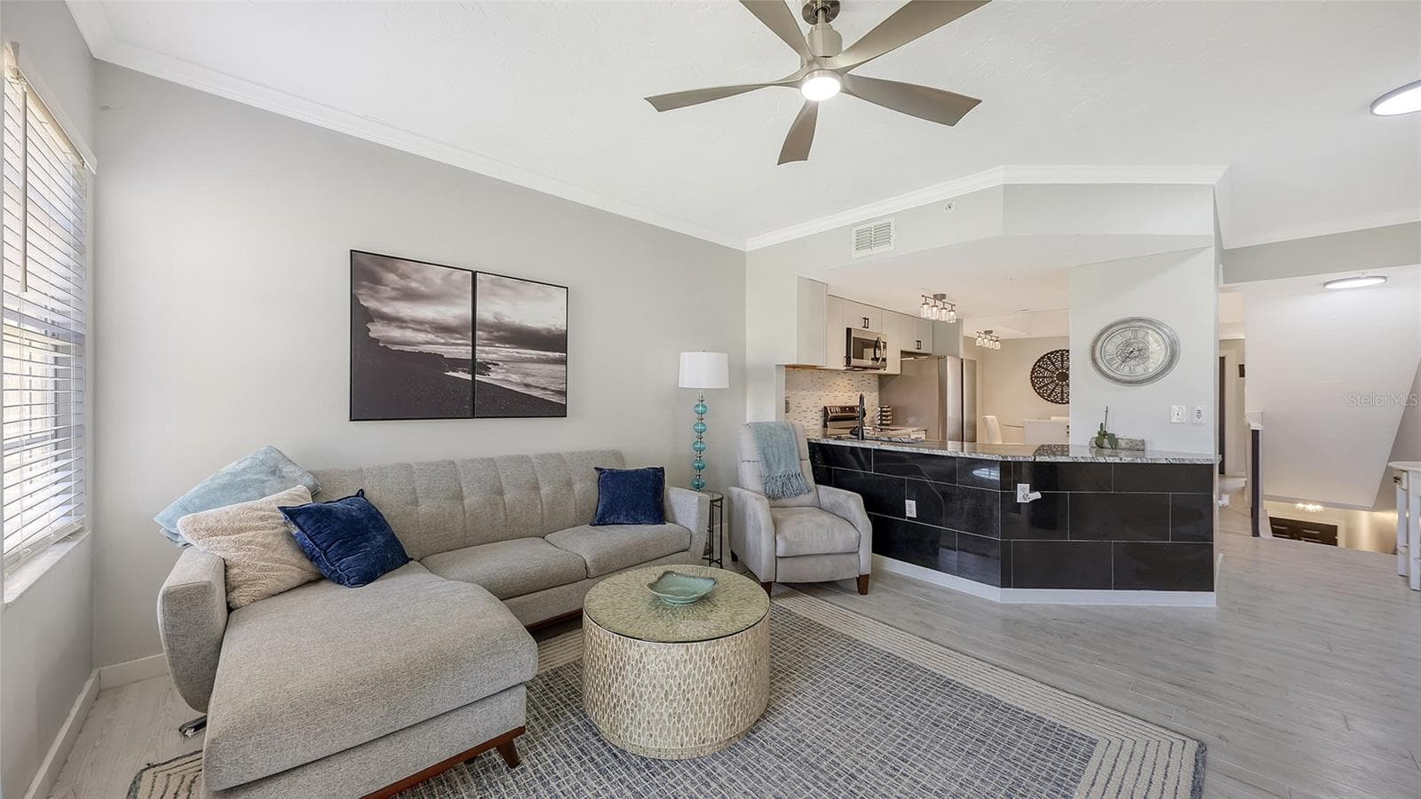 Large family room with tile flooring throughout. - 5655 BENTGRASS DR #9-116, SARASOTA