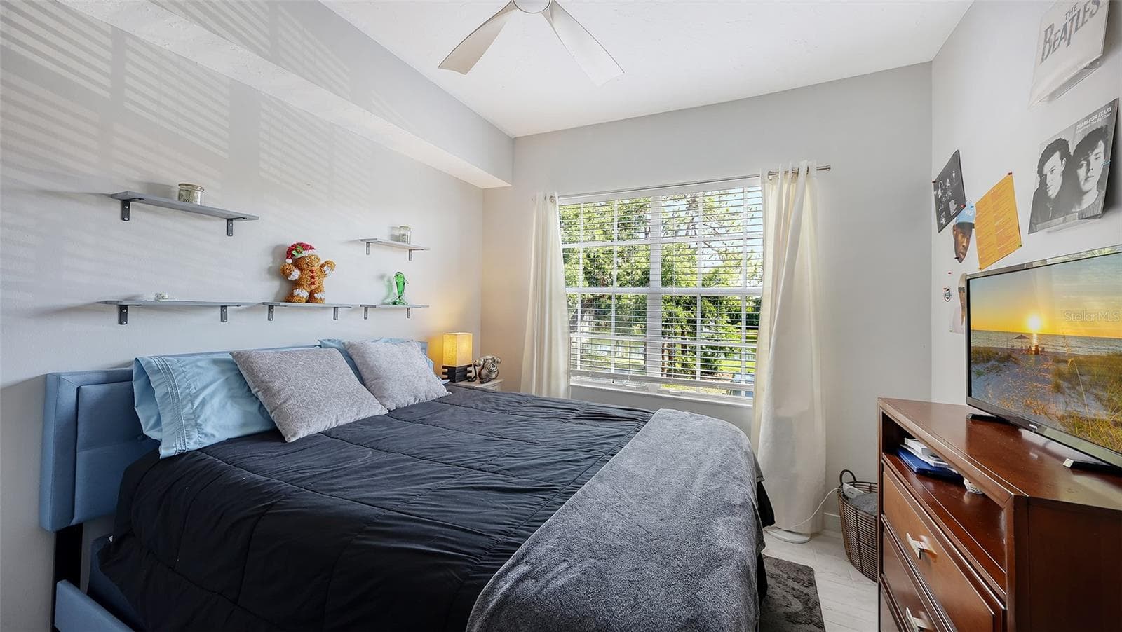This bedroom is on the same floor as the kitchen and family room. - 5655 BENTGRASS DR #9-116, SARASOTA
