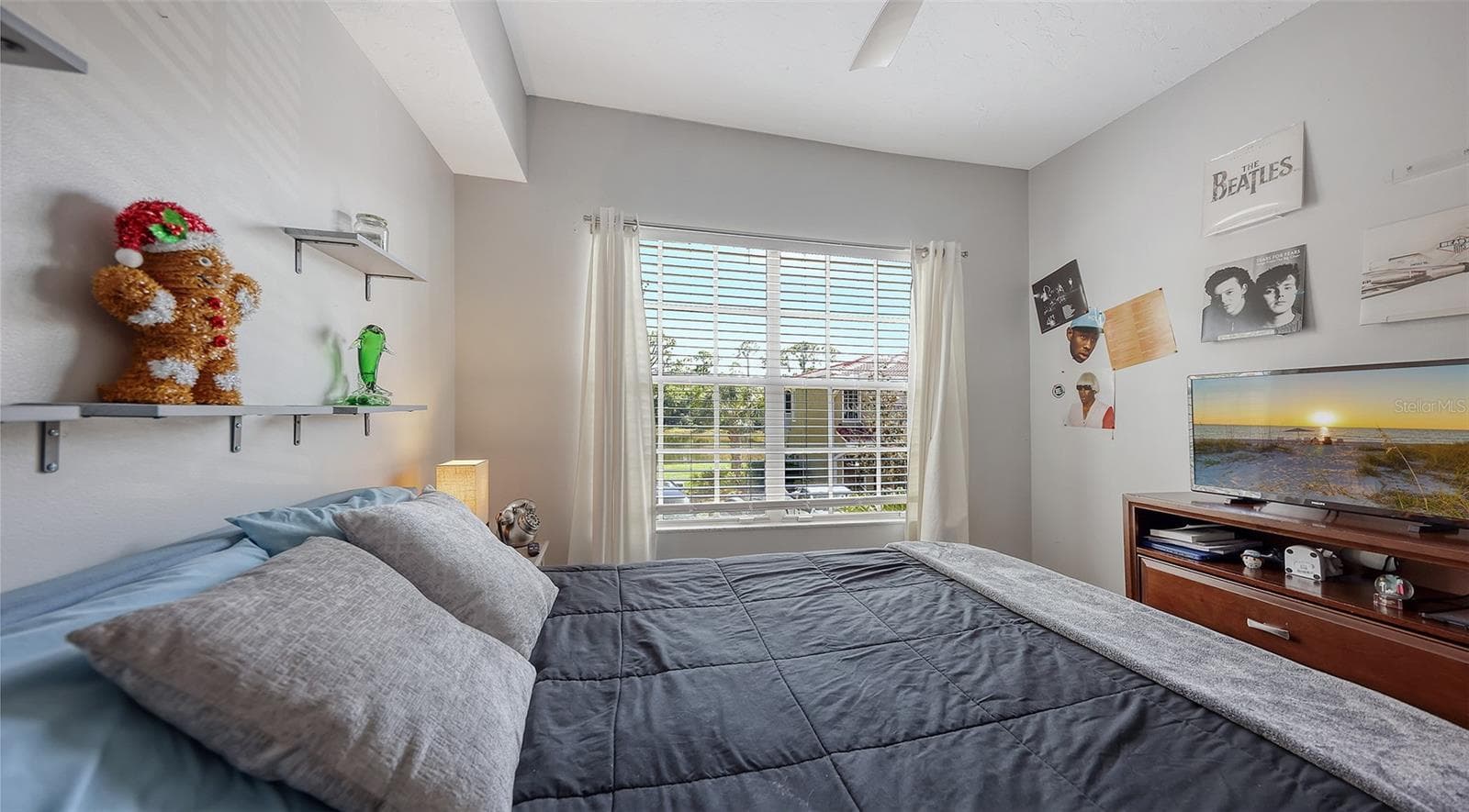 Lake views from this room with shelving in the closet. - 5655 BENTGRASS DR #9-116, SARASOTA