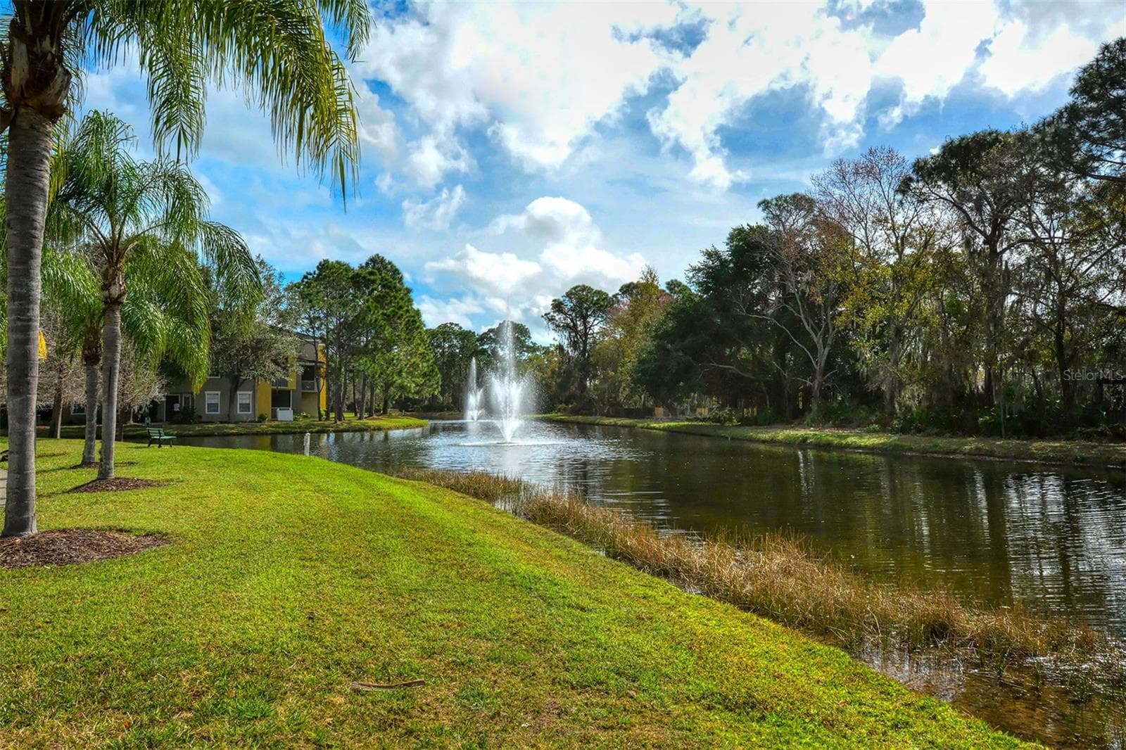 The community is meticulously landscaped. - 5655 BENTGRASS DR #9-116, SARASOTA