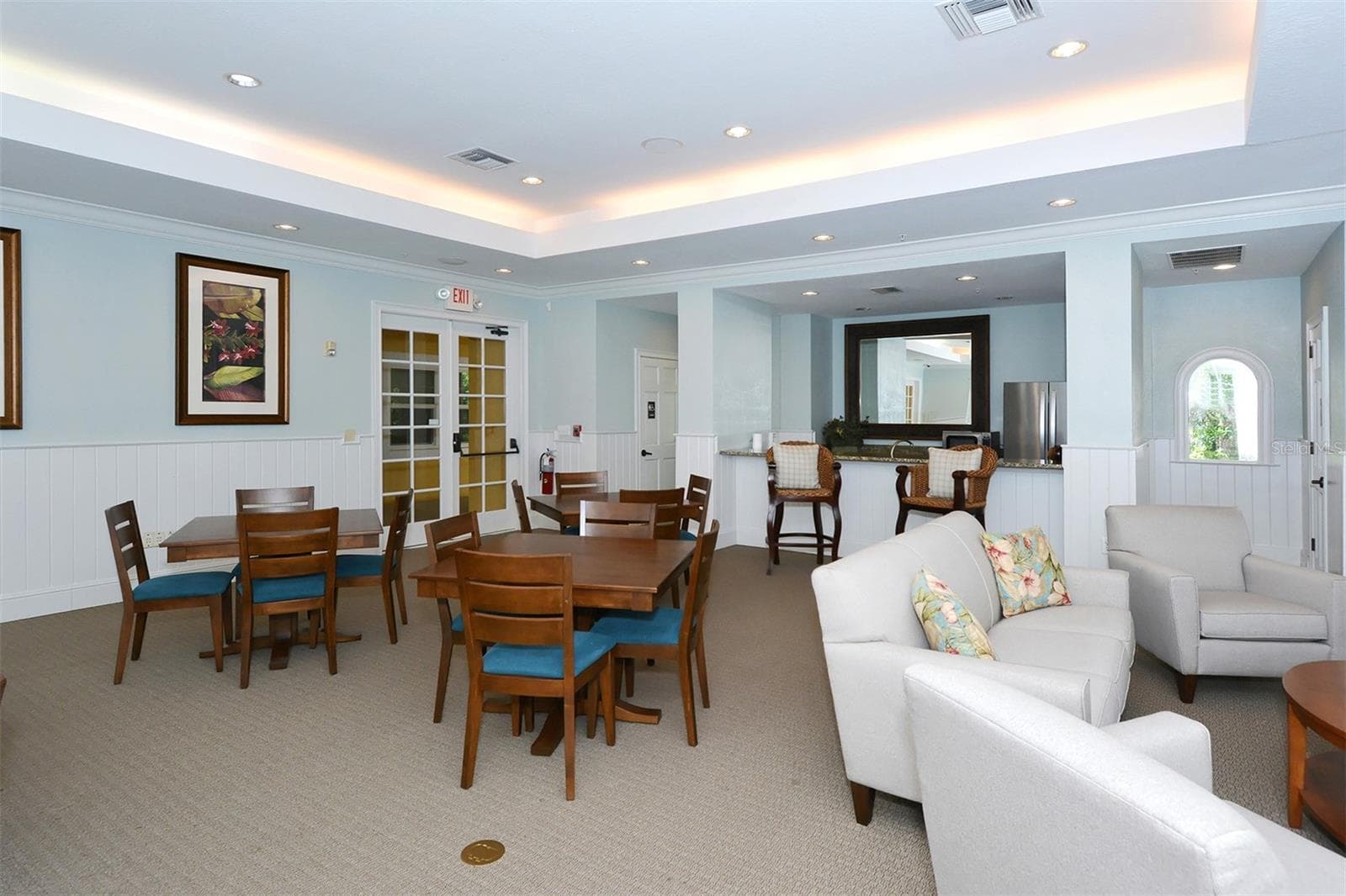 Gathering room in the clubhouse. - 5655 BENTGRASS DR #9-116, SARASOTA