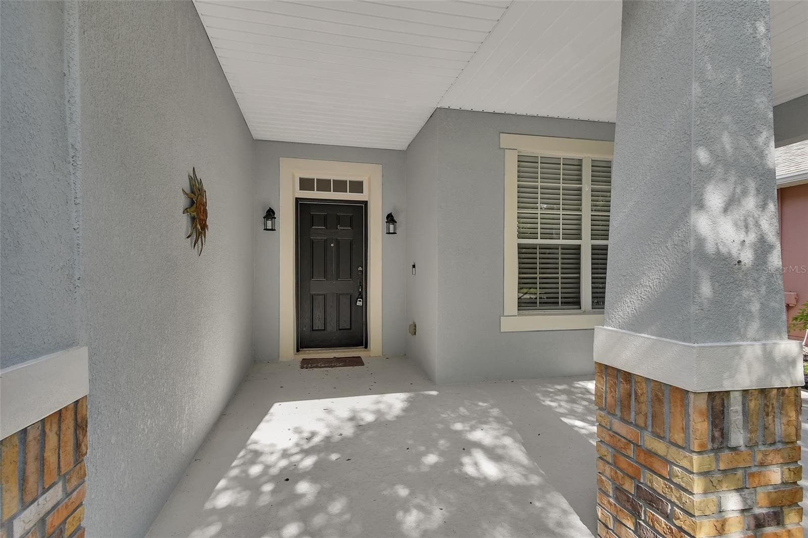 front covered porch - 525 HERON POINT WAY, DELAND