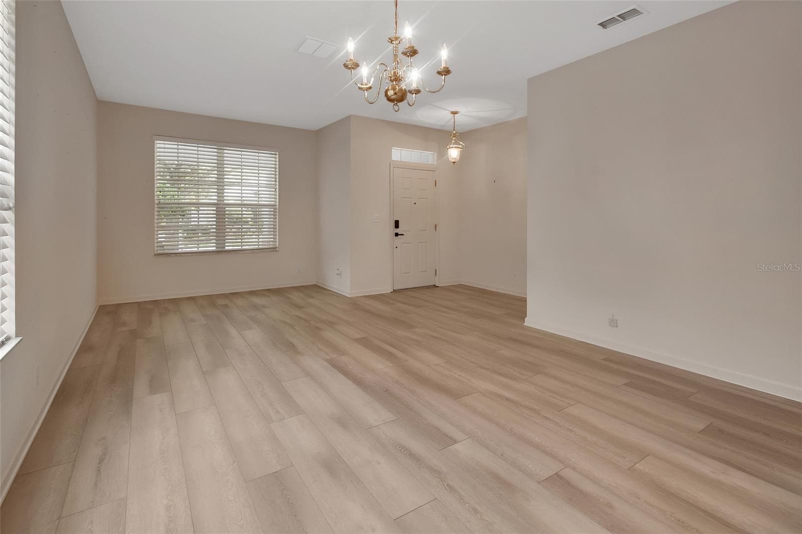 living dining room combo - 525 HERON POINT WAY, DELAND