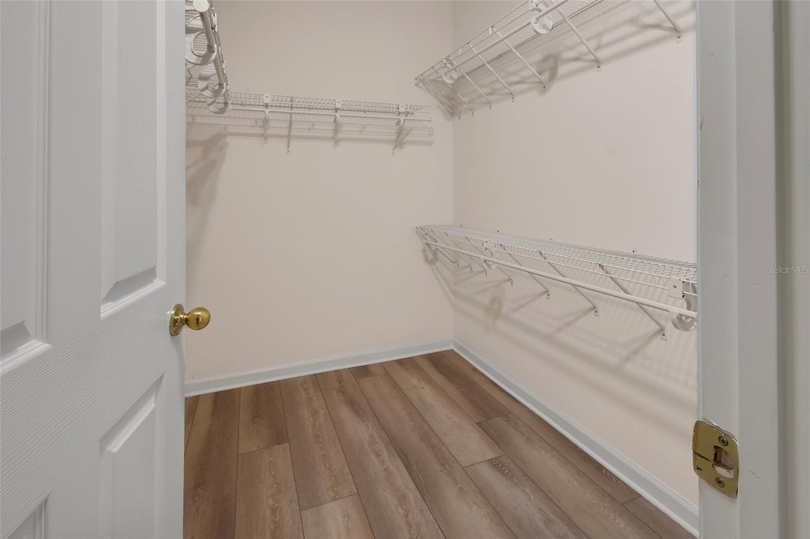 primary walk-in closet - 525 HERON POINT WAY, DELAND
