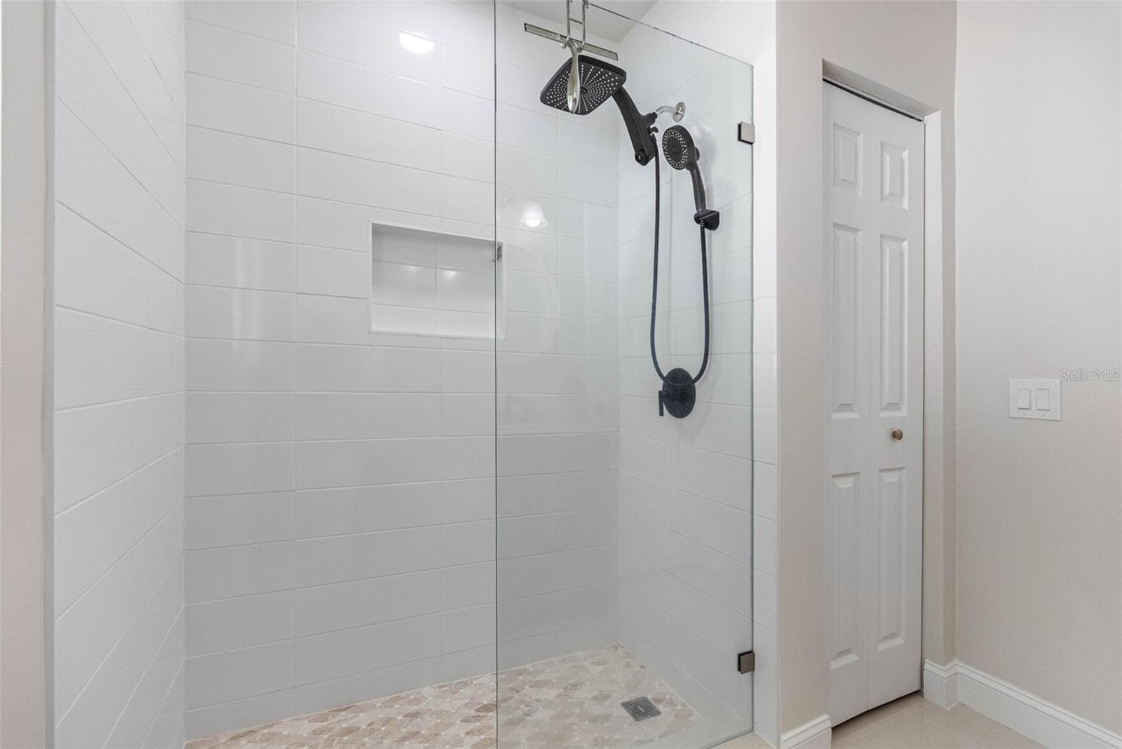 Glass enclosed shower - 1794 SANTA BARBARA DR, DUNEDIN