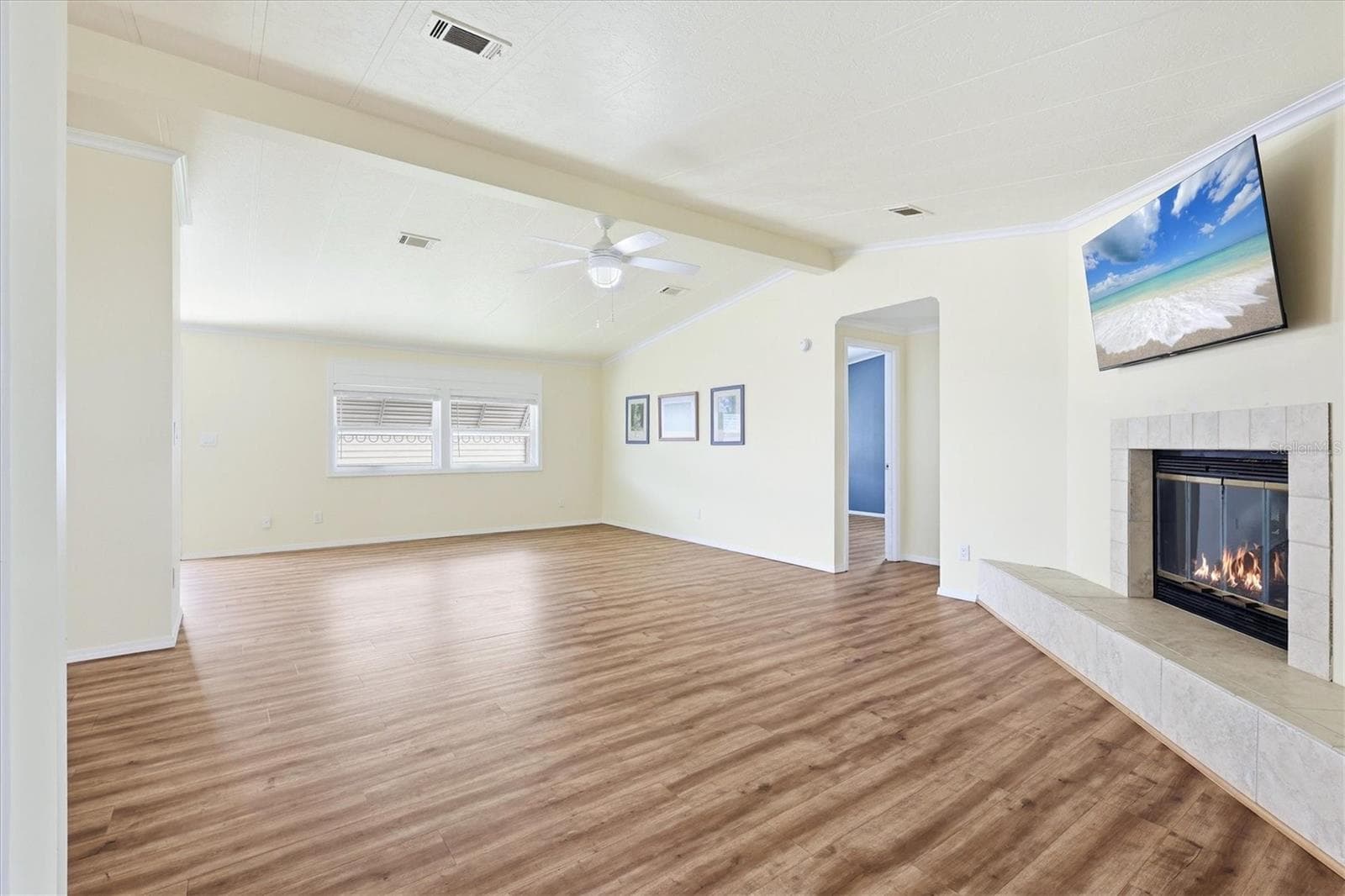 Living Room with electric fireplace - 4308 13TH ST E, ELLENTON