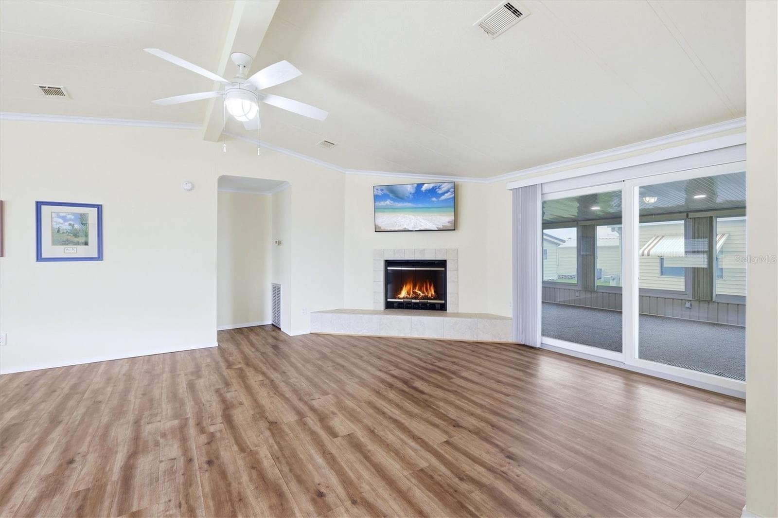 Living Room opens to Florida Room - 4308 13TH ST E, ELLENTON
