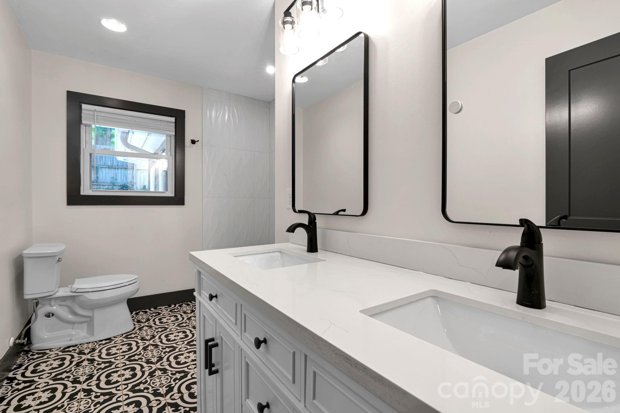 Stylish updates bring a fresh feel to this bathroom space - Arden