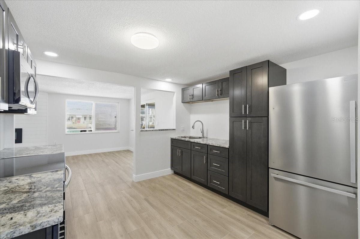 Single Family Residence at 13902 BARNARD AVE, HUDSON, photo 6 of 33