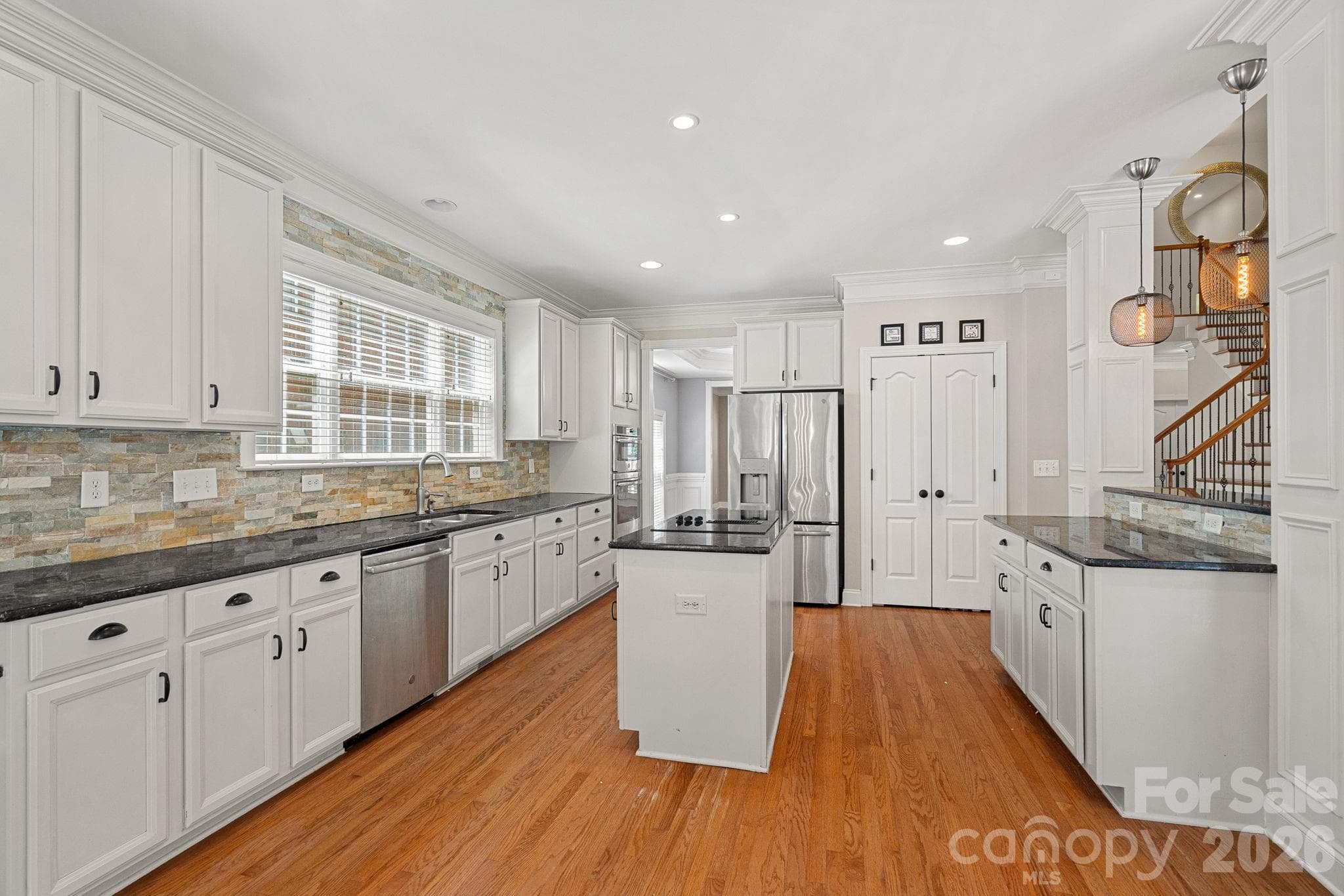 Single Family Residence at 11215 Warfield Avenue, Huntersville, photo 6 of 44
