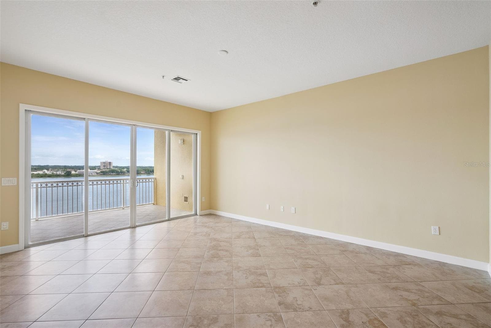 Living area showcasing water views - 8743 THE ESPLANADE #34, ORLANDO