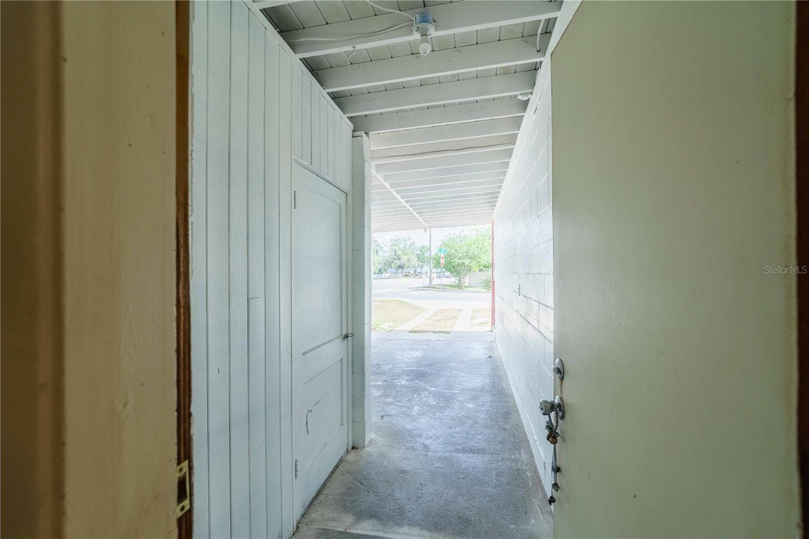 Entrance from bonus room to carport - 3523 SE 6TH ST, OCALA