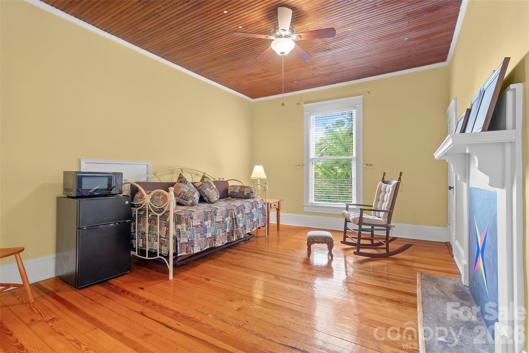 Second floor bedrooms are spacious with hardwood floors, wood bead board ceilings, fireplaces and closets. Bedroom 4 of 5 - 602 N Main Street, Davidson